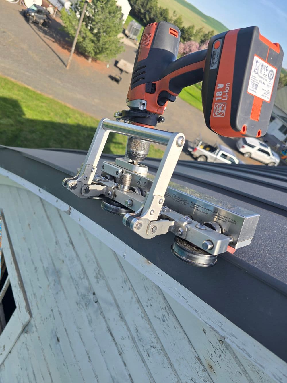 Curved double lock gable trim seam.